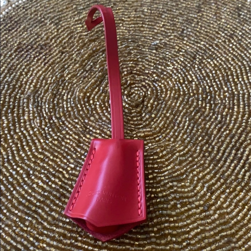 Authentic Louis Vuitton leather clochette key bell